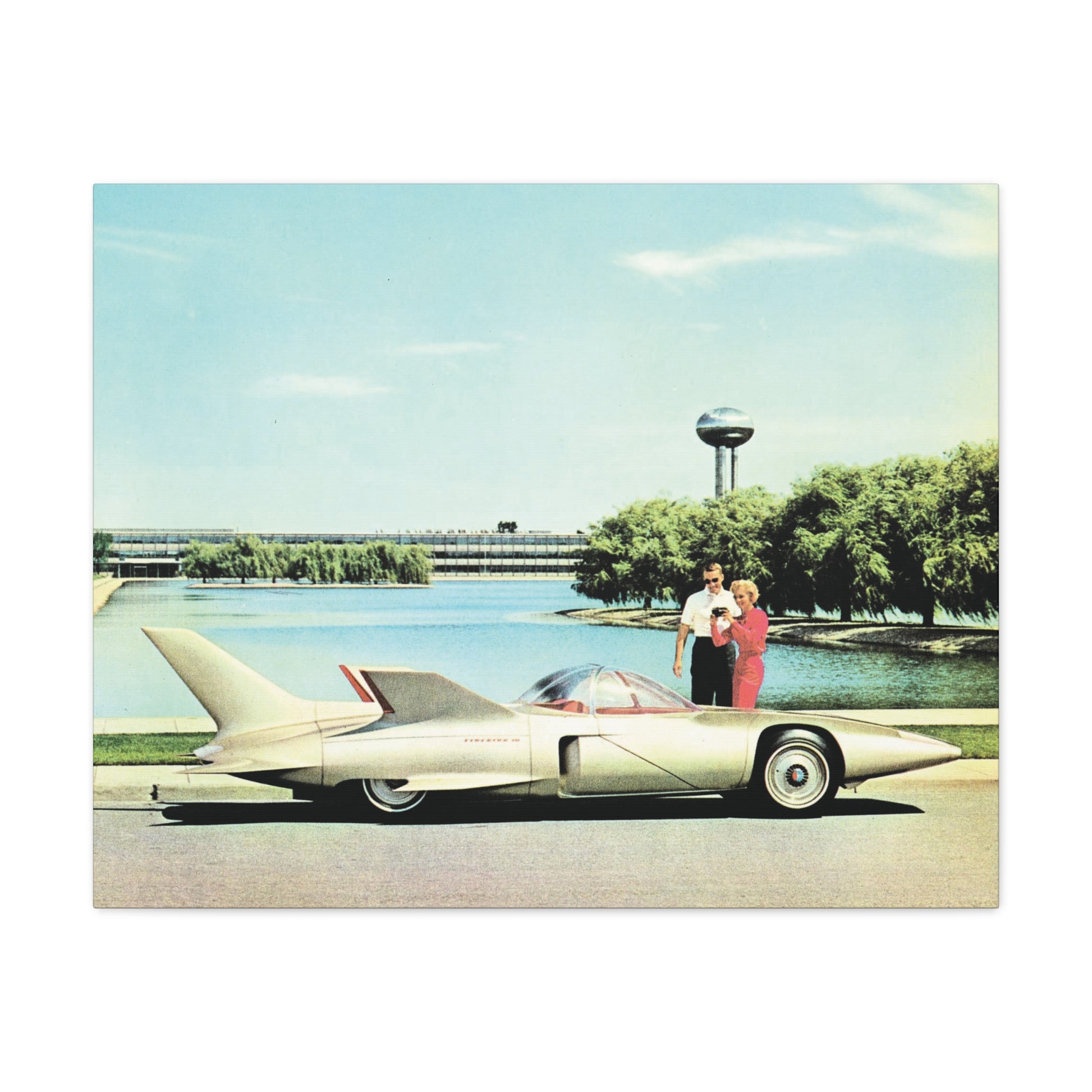 Futuristic concept car with a sleek design in front of a 1950s modernist building and lush greenery.