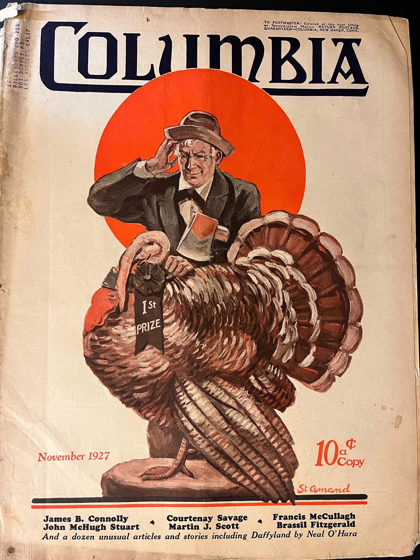 The cover features a whimsical illustration of a man tipping his hat in front of a grand prize turkey, set against a vibrant red backdrop. This eye-catching design captures the celebratory mood of Thanksgiving during the 1920s, with a touch of humor and warmth.