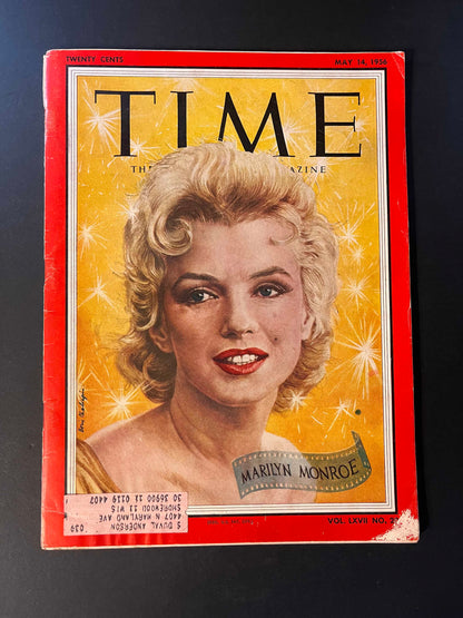 Marilyn Monroe is captured in radiant color against a sparkling background, her image encapsulating the star’s vibrant allure and the timeless impact she has had on film and popular culture.