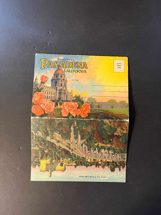 The folder showcases vivid depictions of Pasadena’s attractions, such as the iconic Colorado Street Bridge and the lush grounds of the Los Angeles Turf Club. It unfolds to reveal a treasure trove of hand-picked images that paint a picture of the city's allure in the 1940s.