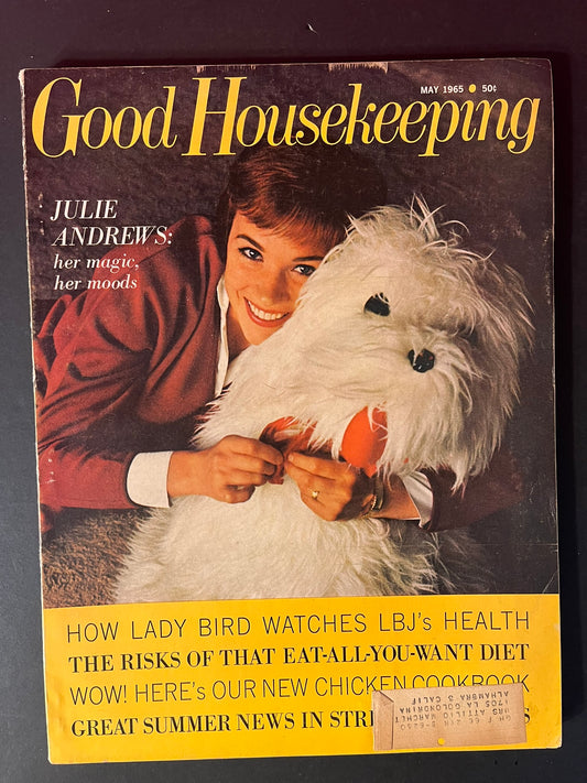 Julie Andrews graces the cover with her magnetic smile, holding a fluffy white dog, a cover that's instantly recognizable and filled with sixties elegance.