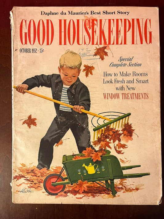 Featuring a young boy raking leaves on the cover, this magazine beautifully illustrates the essence of autumn with its vibrant hues and a sense of joyful domesticity.